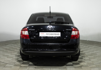 Подержанный автомобиль Skoda Rapid Liftback 2014 года (6 фото)