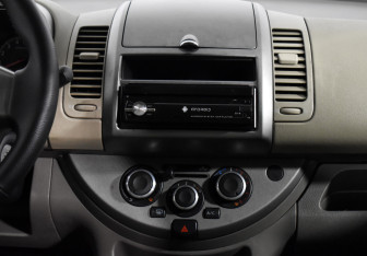 Подержанный автомобиль Nissan Note 2006 года (14 фото)