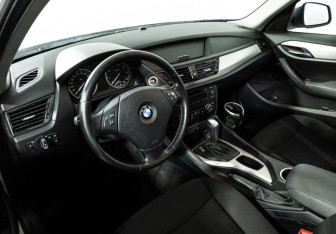 Подержанный автомобиль BMW X1 2014 года (11 фото)