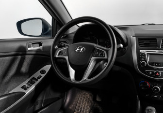 Подержанный автомобиль Hyundai Solaris Hatchback 2014 года (15 фото)