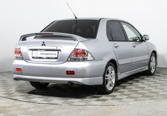 Подержанный автомобиль Mitsubishi Lancer Sedan 2006 года (5 фото)