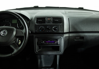 Подержанный автомобиль Skoda Fabia Wagon 2013 года (14 фото)