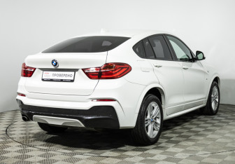 Подержанный автомобиль BMW X4 2015 года (5 фото)