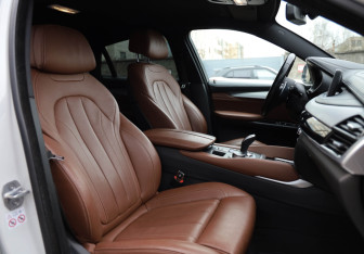 Подержанный автомобиль BMW X6 2018 года (10 фото)