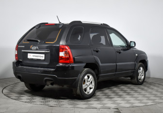 Подержанный автомобиль Kia Sportage 2009 года (5 фото)