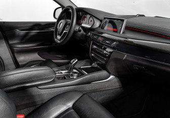 Подержанный автомобиль BMW X6 2015 года (10 фото)
