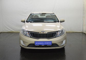 Подержанный автомобиль Kia Rio Sedan 2014 года (2 фото)
