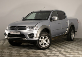 Подержанный автомобиль Mitsubishi L200 2014 года (2 фото)