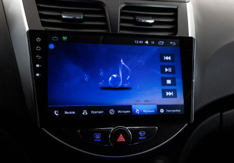 Подержанный автомобиль Hyundai Solaris Hatchback 2012 года (14 фото)