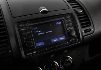 Подержанный автомобиль Nissan Note 2013 года (16 фото)