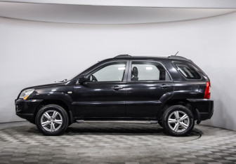 Подержанный автомобиль Kia Sportage 2009 года (8 фото)