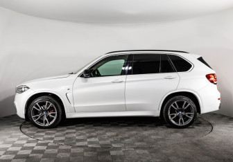 Подержанный автомобиль BMW X5 2015 года (9 фото)
