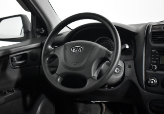 Подержанный автомобиль Kia Sportage 2009 года (15 фото)