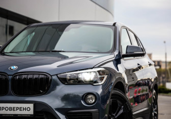 Подержанный автомобиль BMW X1 2016 года (2 фото)