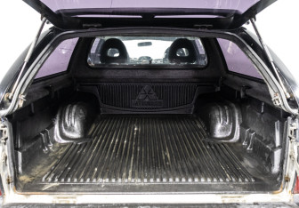 Подержанный автомобиль Mitsubishi L200 2005 года (16 фото)