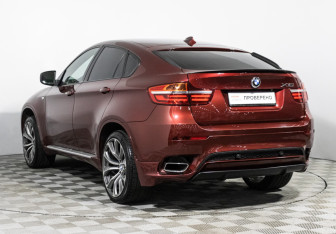 Подержанный автомобиль BMW X6 2013 года (7 фото)