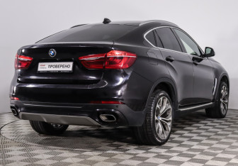 Подержанный автомобиль BMW X6 2016 года (10 фото)