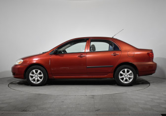 Подержанный автомобиль Toyota Corolla Sedan 2002 года (8 фото)