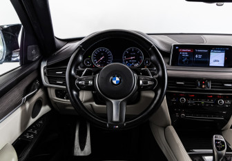 Подержанный автомобиль BMW X6 2018 года (15 фото)