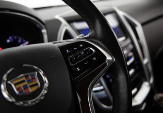Подержанный автомобиль Cadillac SRX 2013 года (26 фото)