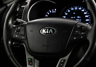 Подержанный автомобиль Kia Sorento 2014 года (11 фото)