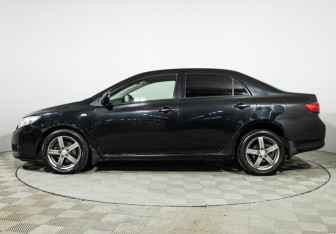 Подержанный автомобиль Toyota Corolla Sedan 2008 года (8 фото)
