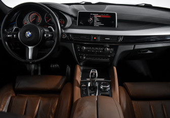Подержанный автомобиль BMW X6 2016 года (11 фото)