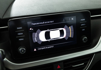 Подержанный автомобиль Skoda Rapid Liftback 2021 года (15 фото)