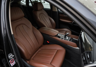 Подержанный автомобиль BMW X6 2017 года (30 фото)