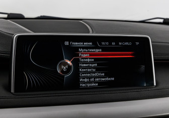 Подержанный автомобиль BMW X6 2015 года (14 фото)