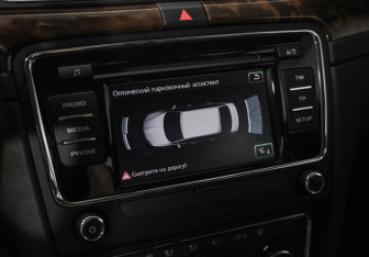 Подержанный автомобиль Skoda Superb Liftback 2014 года (14 фото)