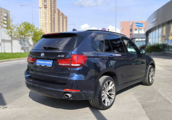 Подержанный автомобиль BMW X5 2014 года (4 фото)