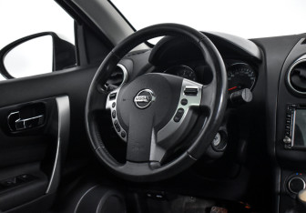 Подержанный автомобиль Nissan Qashqai+2 2013 года (13 фото)