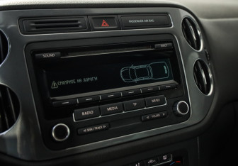 Подержанный автомобиль Volkswagen Tiguan 2012 года (14 фото)