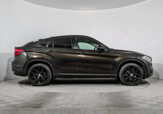 Подержанный автомобиль BMW X6 2015 года (4 фото)