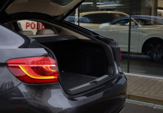 Подержанный автомобиль BMW X6 2016 года (23 фото)