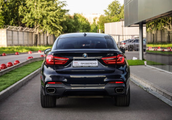Подержанный автомобиль BMW X6 2017 года (8 фото)