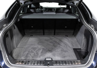 Подержанный автомобиль BMW X4 2015 года (20 фото)