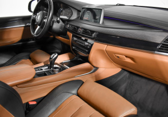 Подержанный автомобиль BMW X6 2014 года (15 фото)