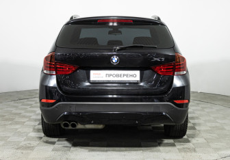 Подержанный автомобиль BMW X1 2013 года (6 фото)