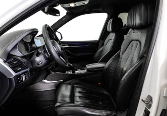 Подержанный автомобиль BMW X5 2015 года (26 фото)