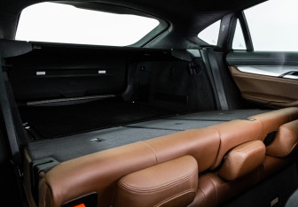 Подержанный автомобиль BMW X6 2015 года (26 фото)