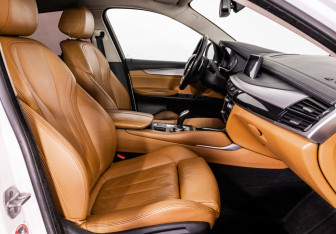 Подержанный автомобиль BMW X6 2015 года (20 фото)