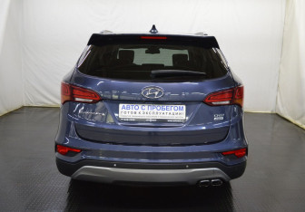 Подержанный автомобиль Hyundai Santa Fe 2016 года (6 фото)
