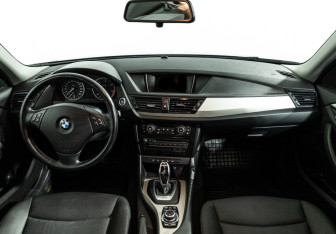 Подержанный автомобиль BMW X1 2014 года (13 фото)