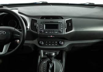 Подержанный автомобиль Kia Sportage 2013 года (14 фото)