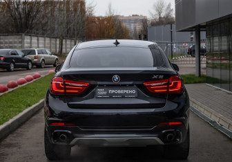 Подержанный автомобиль BMW X6 2015 года (6 фото)