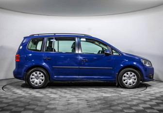 Подержанный автомобиль Volkswagen Touran 2012 года (4 фото)