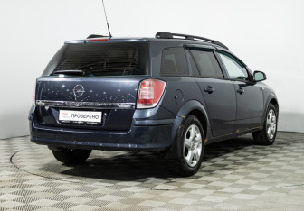 Подержанный автомобиль Opel Astra Wagon 2010 года (5 фото)