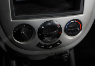 Подержанный автомобиль Chevrolet Lacetti Sedan 2012 года (12 фото)